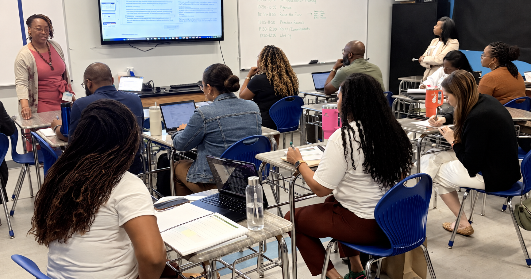 Dr. LaVoulle leading an instructional leadership professional development workshop with educators